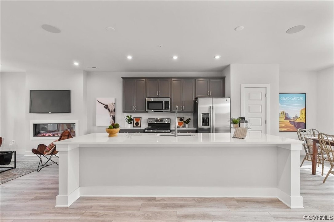 Open layout second floor offers eat-in kitchen wit