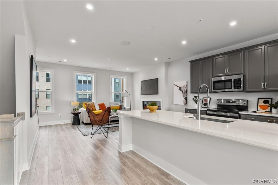 Open layout kitchen and family room.