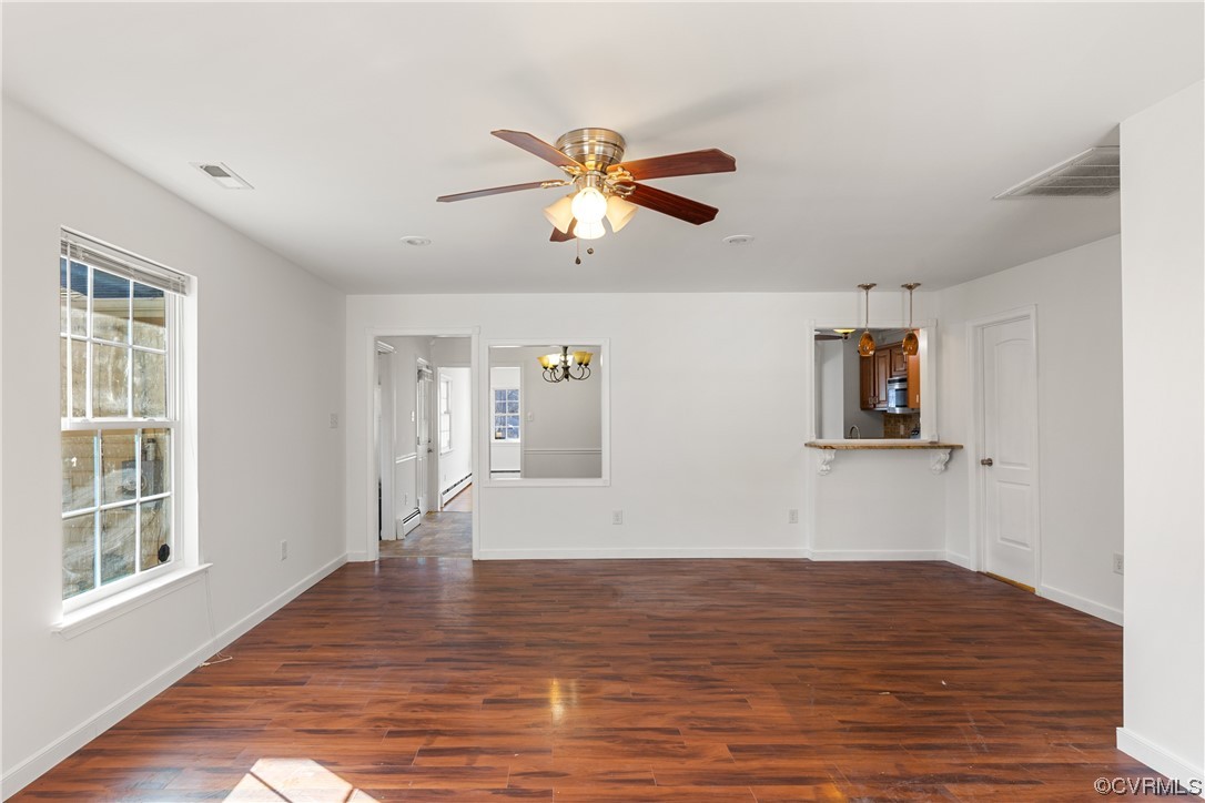 Family room with doorway to dining area and pass t