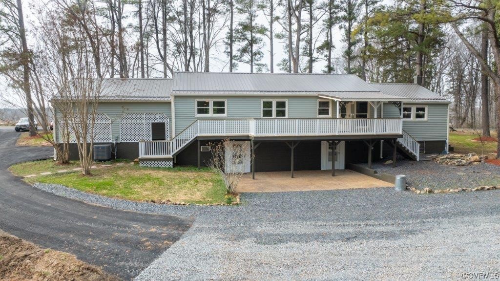 View of front of property featuring central air co