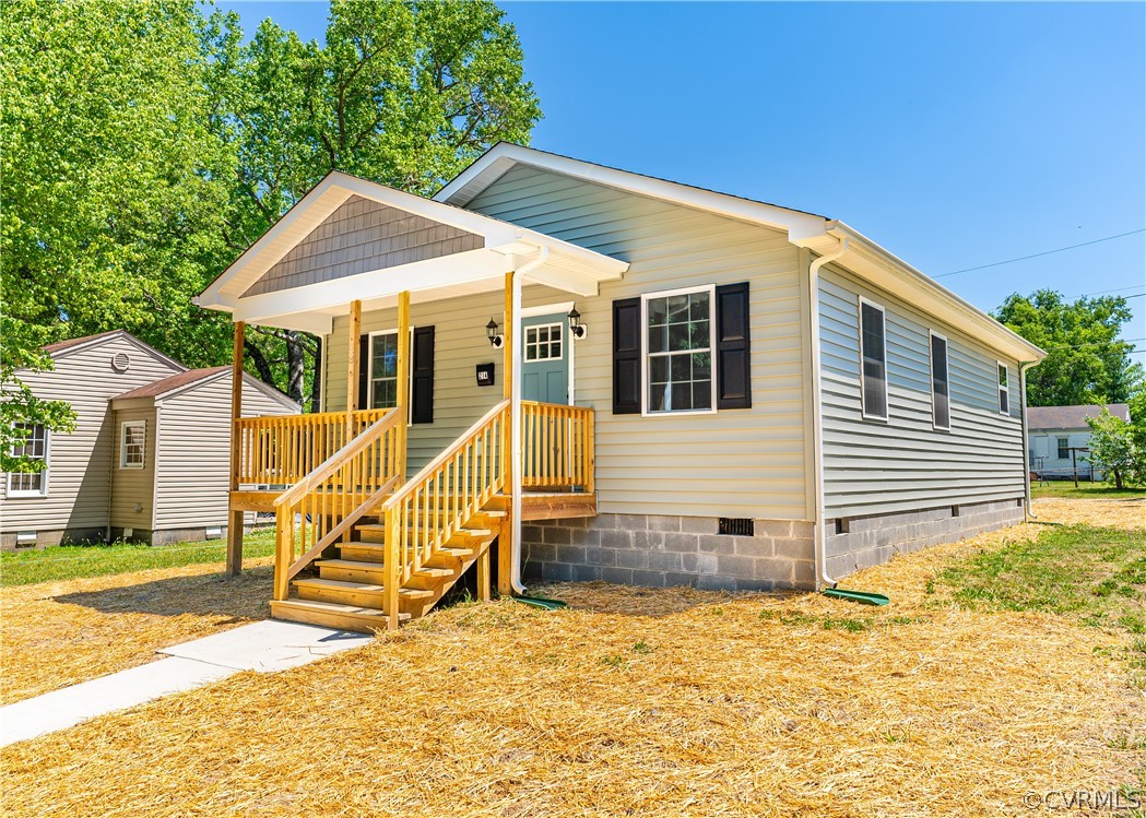 Bungalow featuring a porch