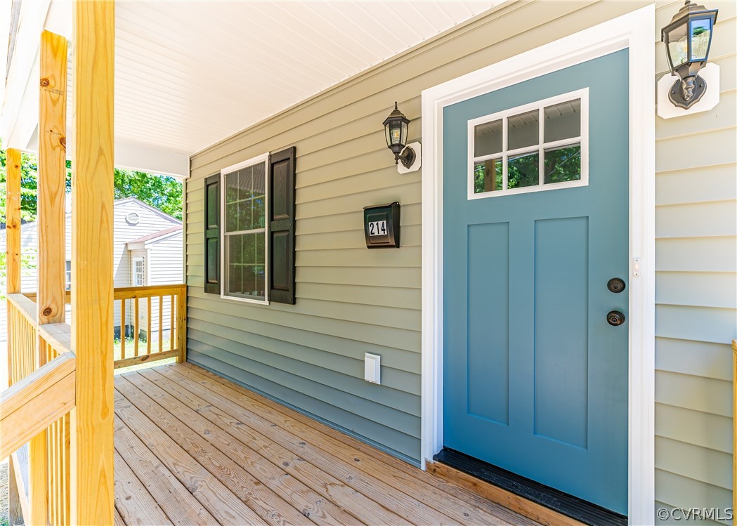 Property entrance with a porch