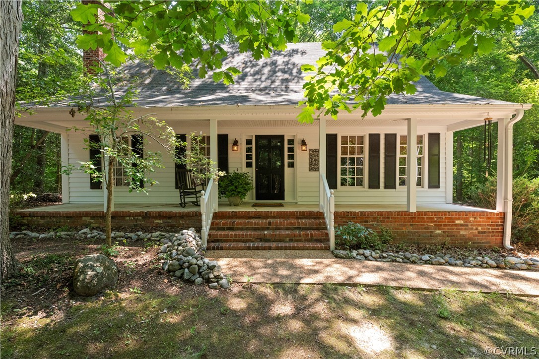 View of front of home with a porch