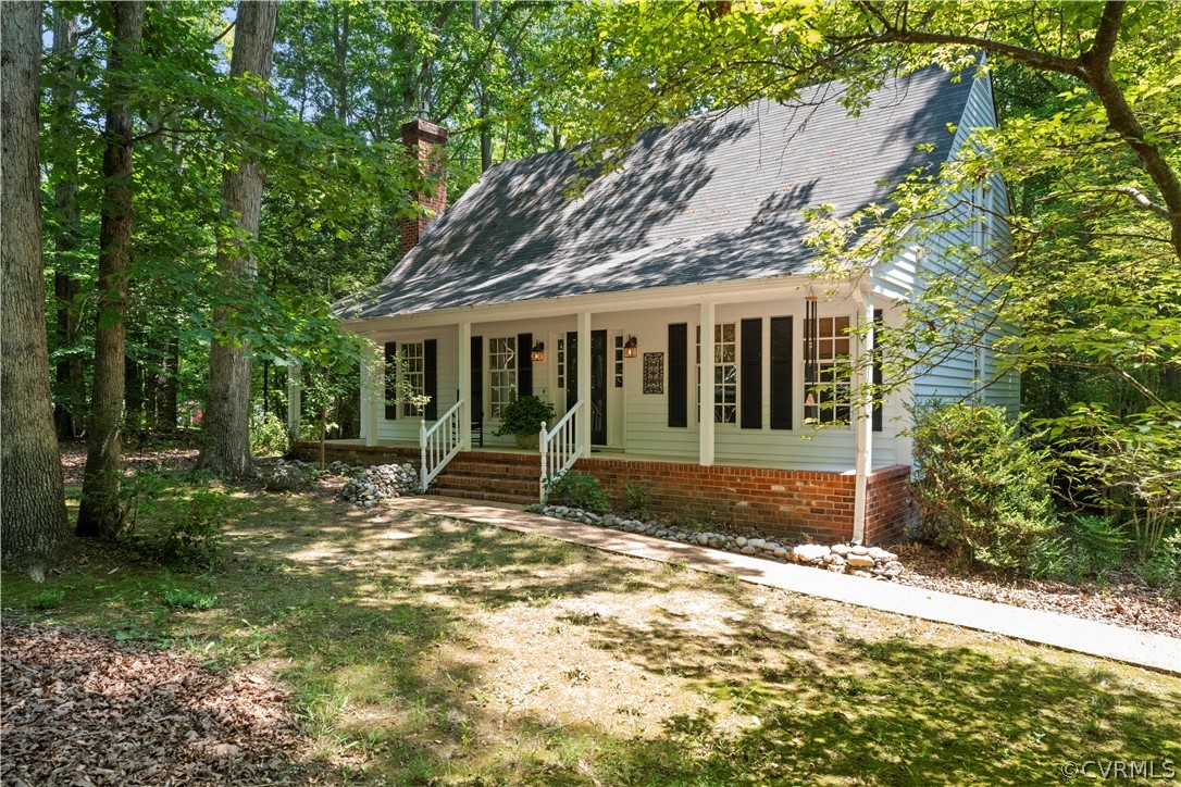View of front of property featuring covered porch