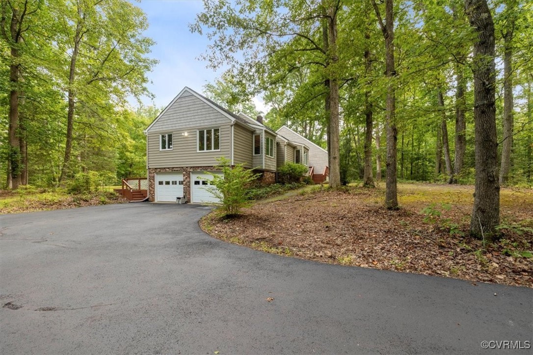 View of home's exterior with a garage