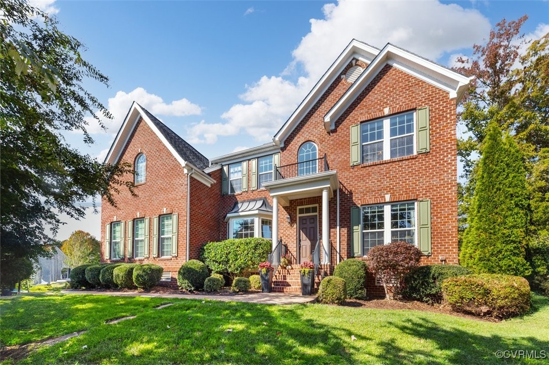 View of front of home featuring a front yard