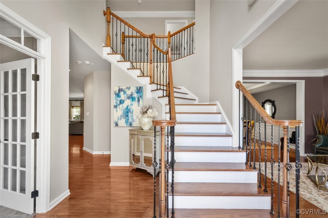 Stairs with ornamental molding and hardwood / wood