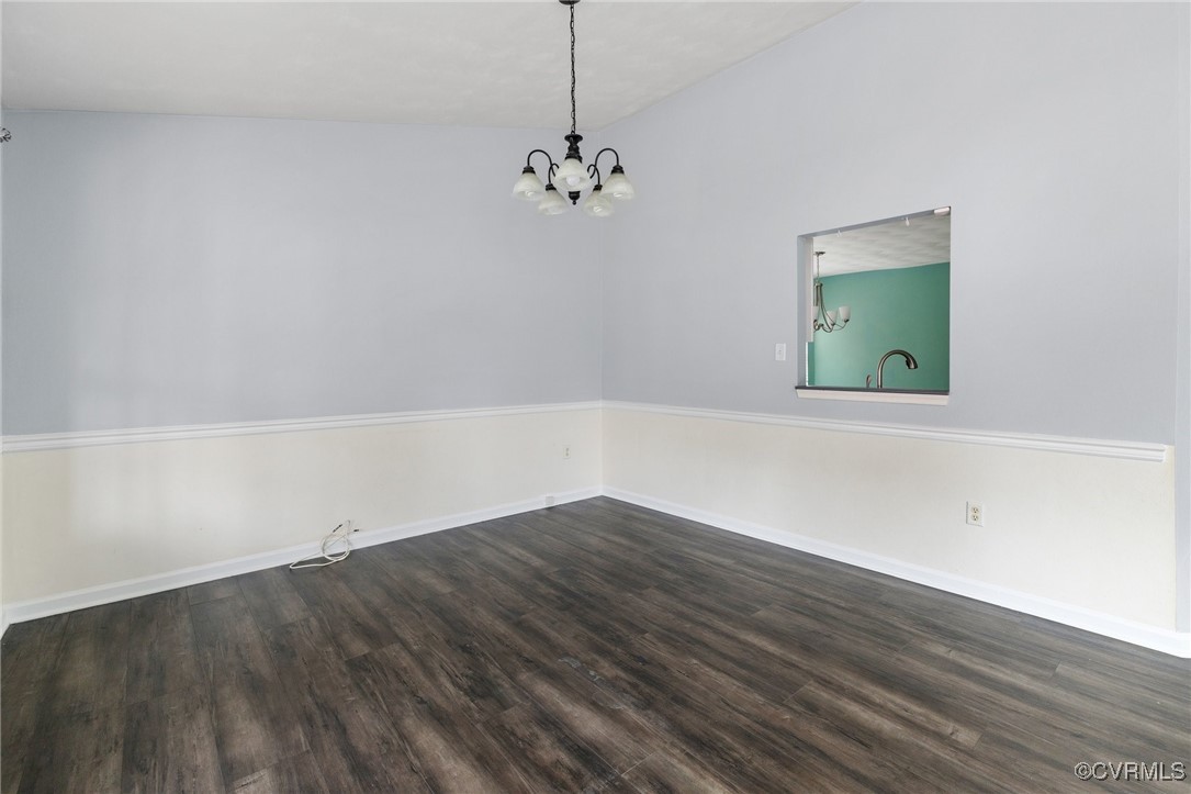 Unfurnished room with high vaulted ceiling, wood-t