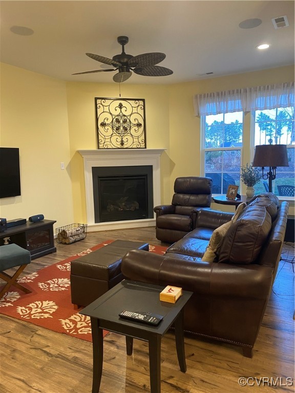 Living room featuring hardwood / wood-style floori