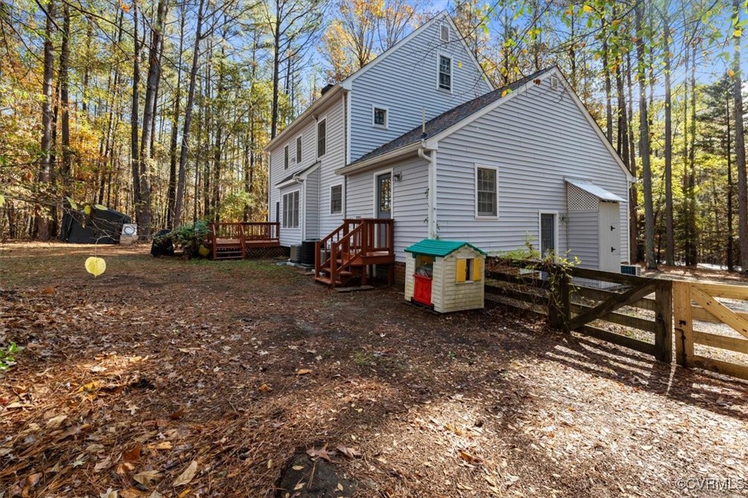 2605 Butterwood Dr Rear view of property featuring central AC and a d