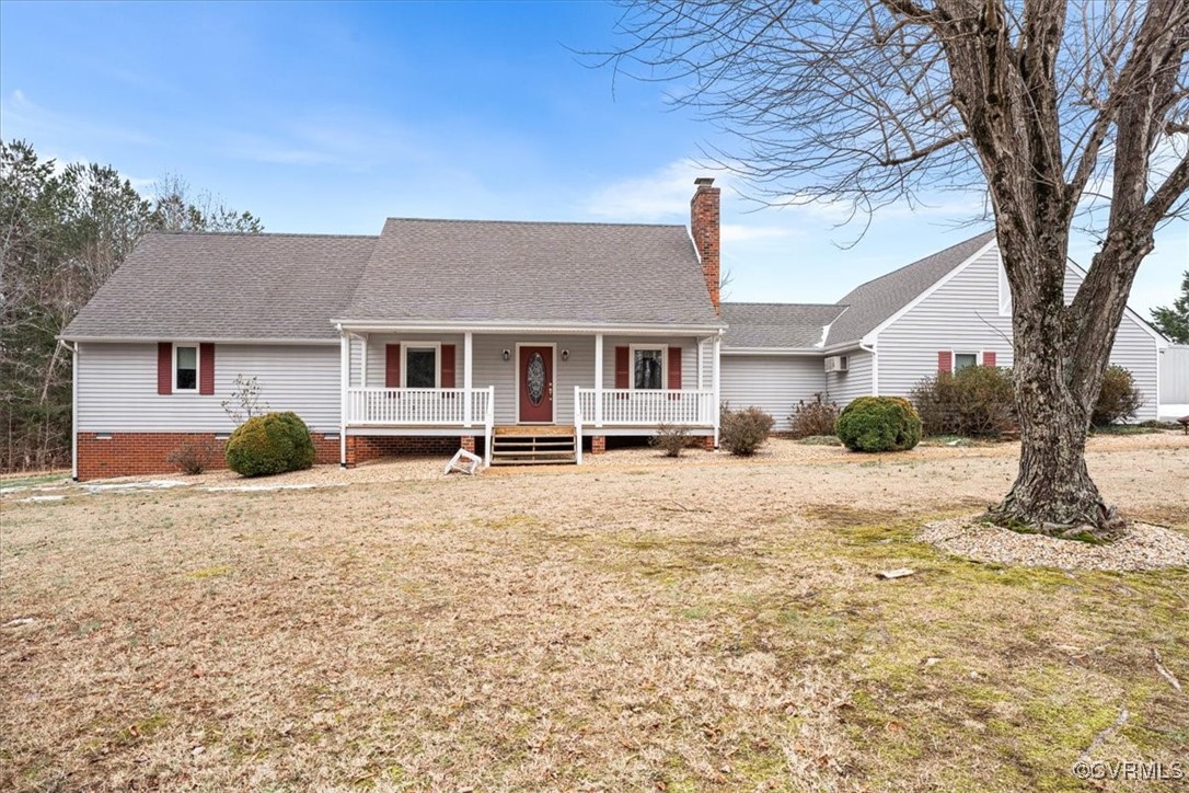 Single story home featuring covered porch and a fr
