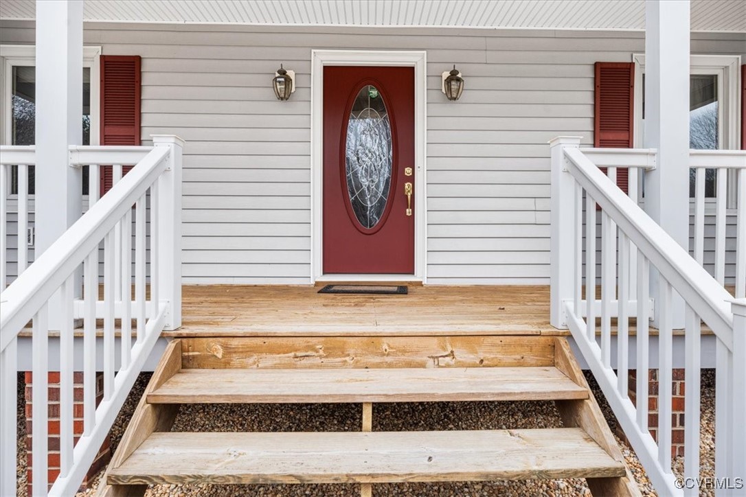 Property entrance featuring a porch