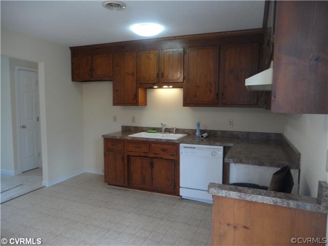 2827 Three Bridge Road Kitchen - New counter tops, sink and floor. New r