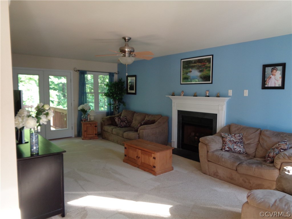 Family room, gas fireplace, ceiling fan and new ca