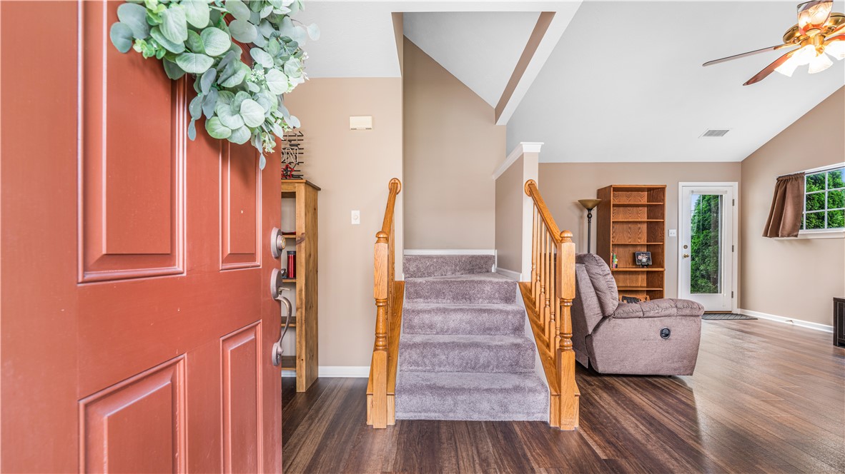 6120 Caledonia Court The entry is warm and invited with Luxury Plank Fl
