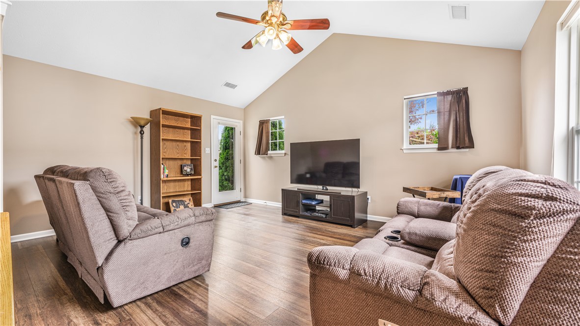 6120 Caledonia Court The Living Room is spacious with vaulted ceiling,