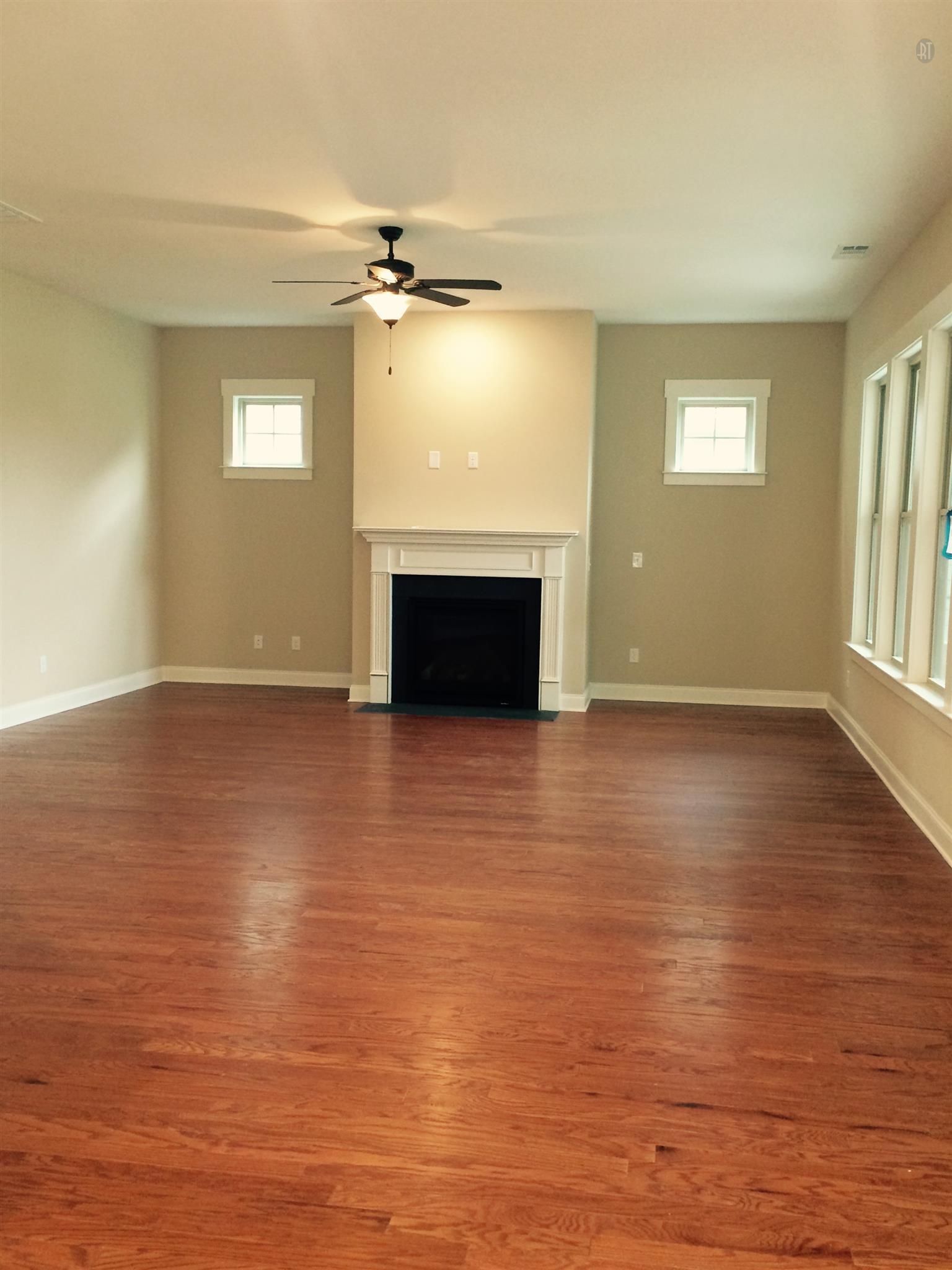Great room. This is not the home under construction but images from another home of the same floor plan.