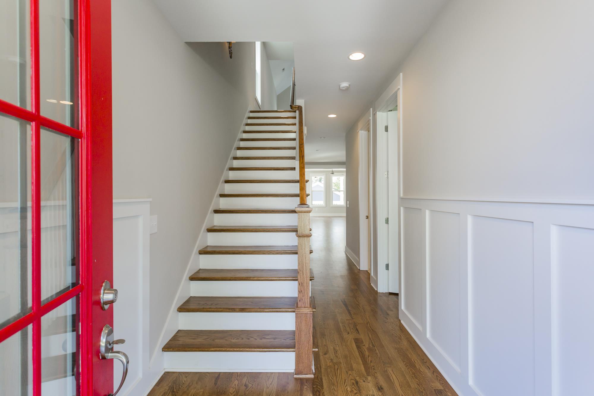 Wainscotting in the foyer with nice wood detailing! 