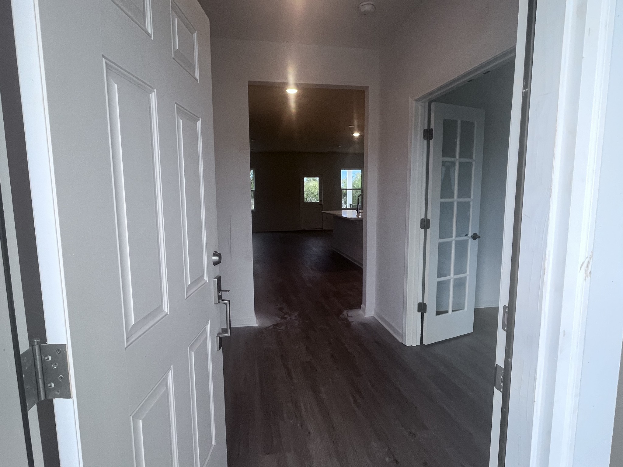 106 Glacier Way Welcome guests in this dedicted Foyer Entry with nook for a table / shoe storage, art, etc. Glass Study doors for maximum Work From Home productivity!