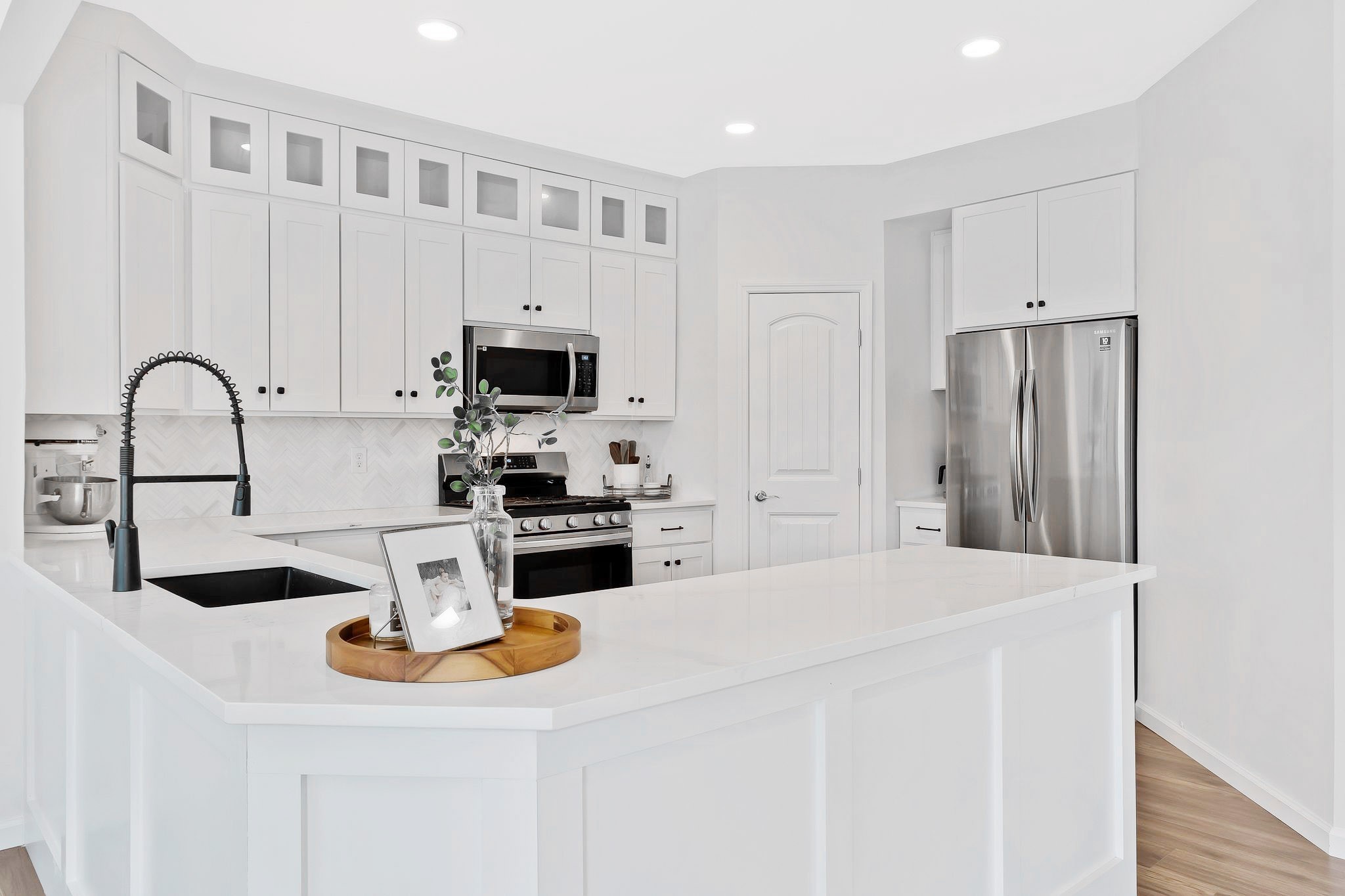 1013 Prince St STUNNING brand new Kitchen with floor to ceiling cabinets, quartz countertops, new sink, faucet, new appliances, custom wood work, custom built pantry shelving and so much more!