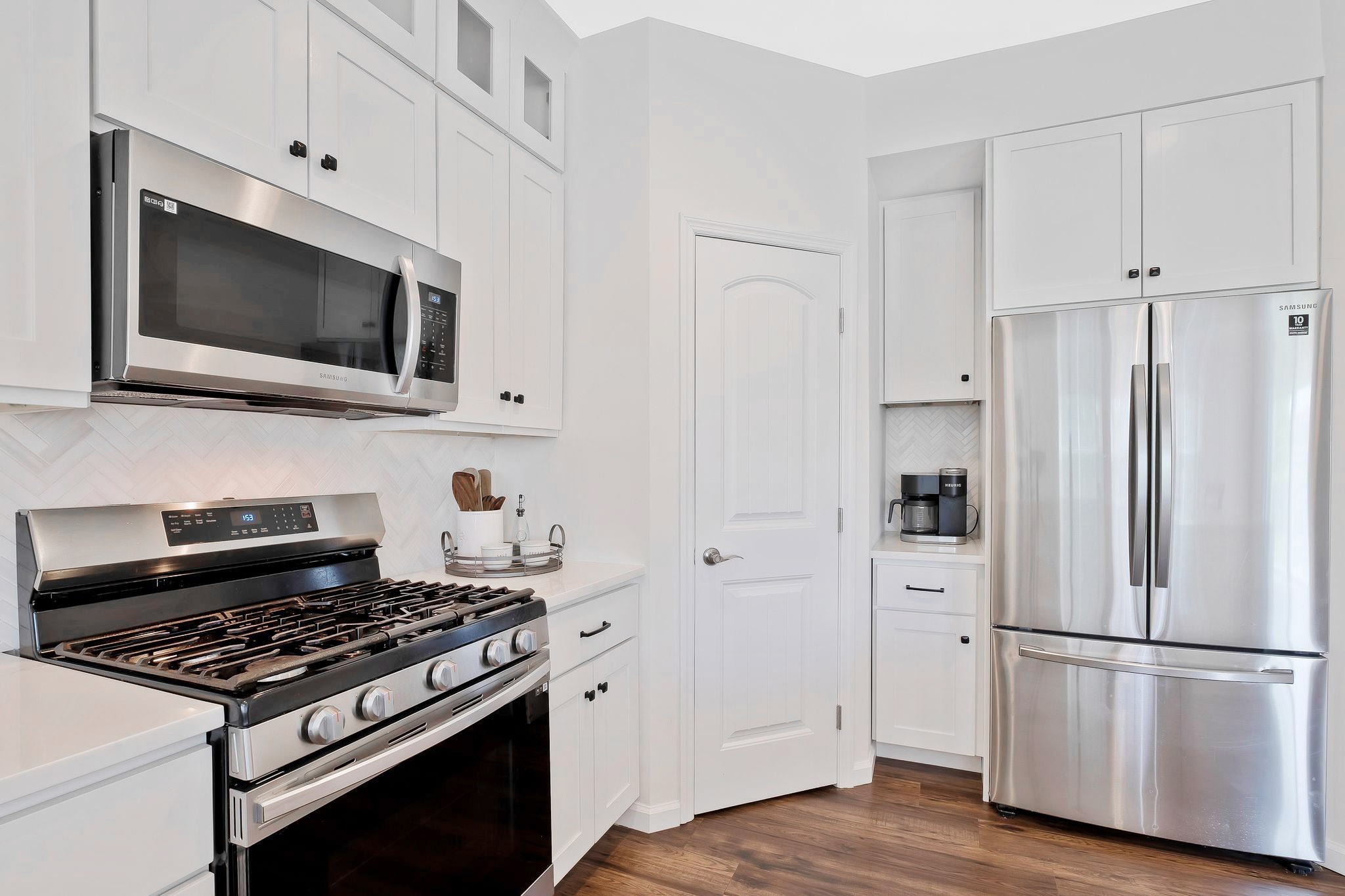 1013 Prince St New appliances, pantry with custom built wood shelving, and little coffee bar area
