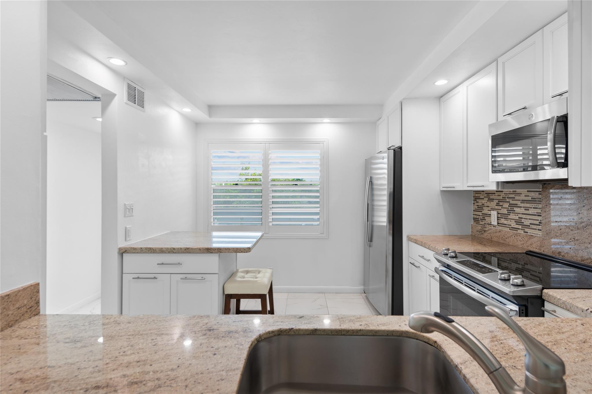 Plantation Shutters in the eat in kitchen area