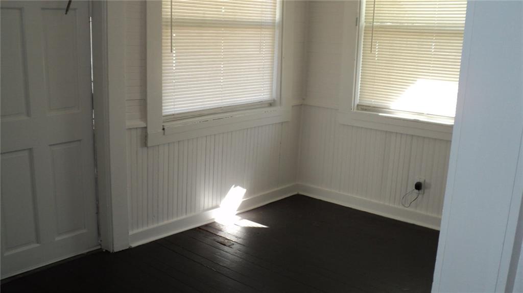 Enclosed front porch for additional living space