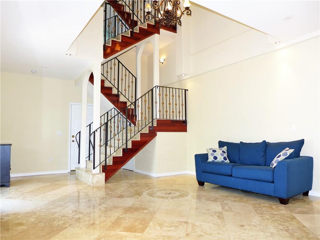 Traventine tile with custom tile work, Grand stair