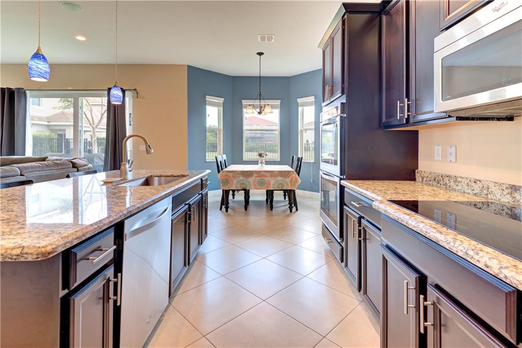 Large Kitchen with granite counters, stainless ste