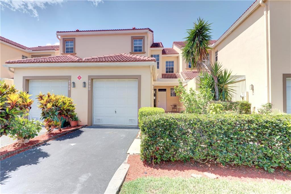 Front of home with 1 car garage