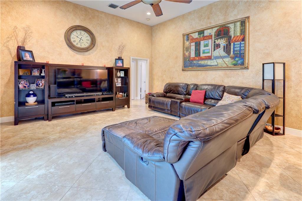Large living room with high ceilings.