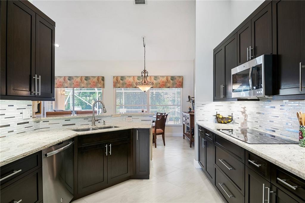 6440 NW 54th St stunning tile and granite