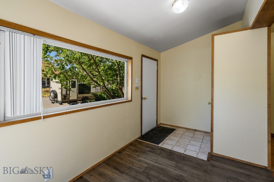 The large front window creates a bright and sunny