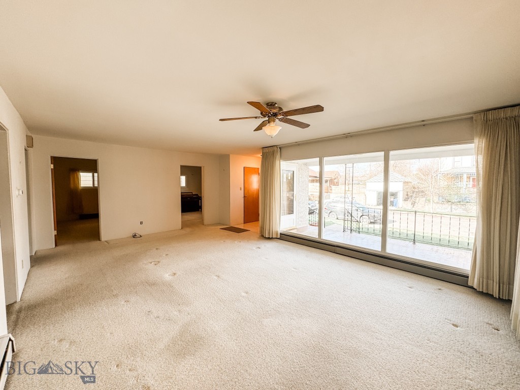 BIG picture windows in living room of front unit