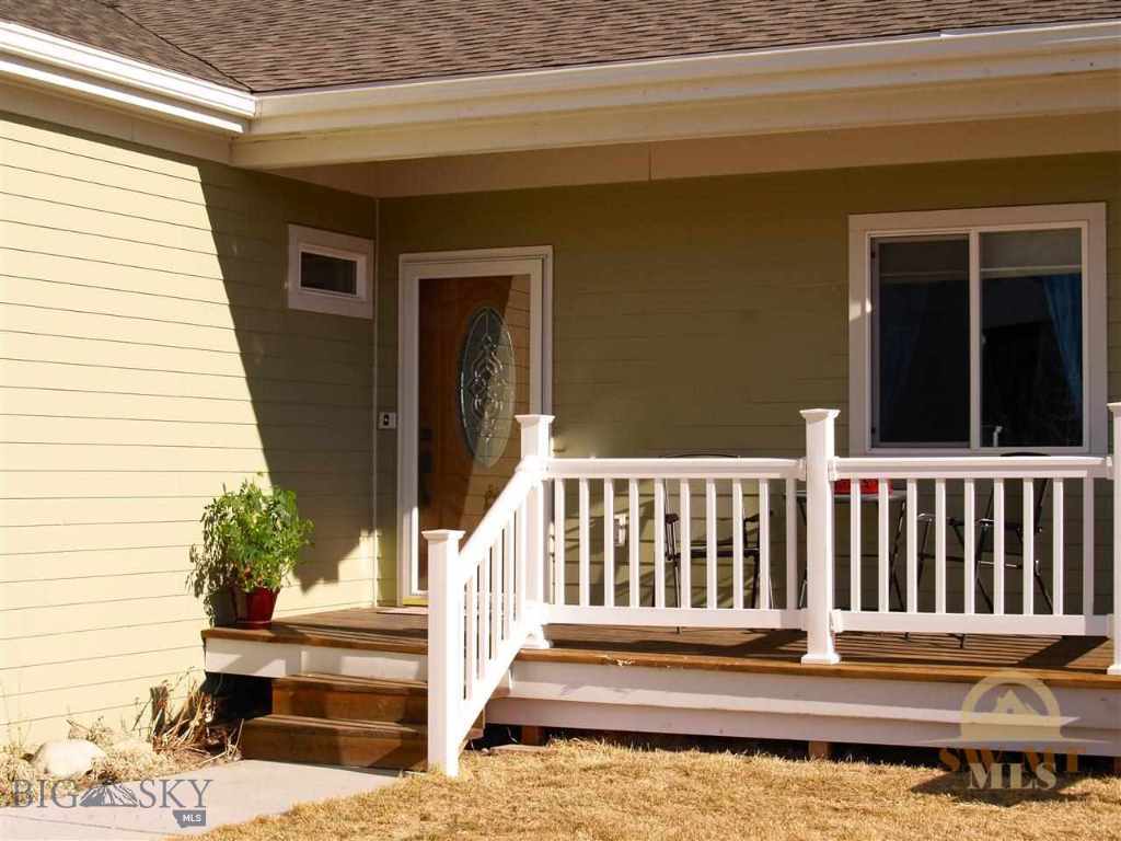 Welcoming Front Porch with Sitting Area
