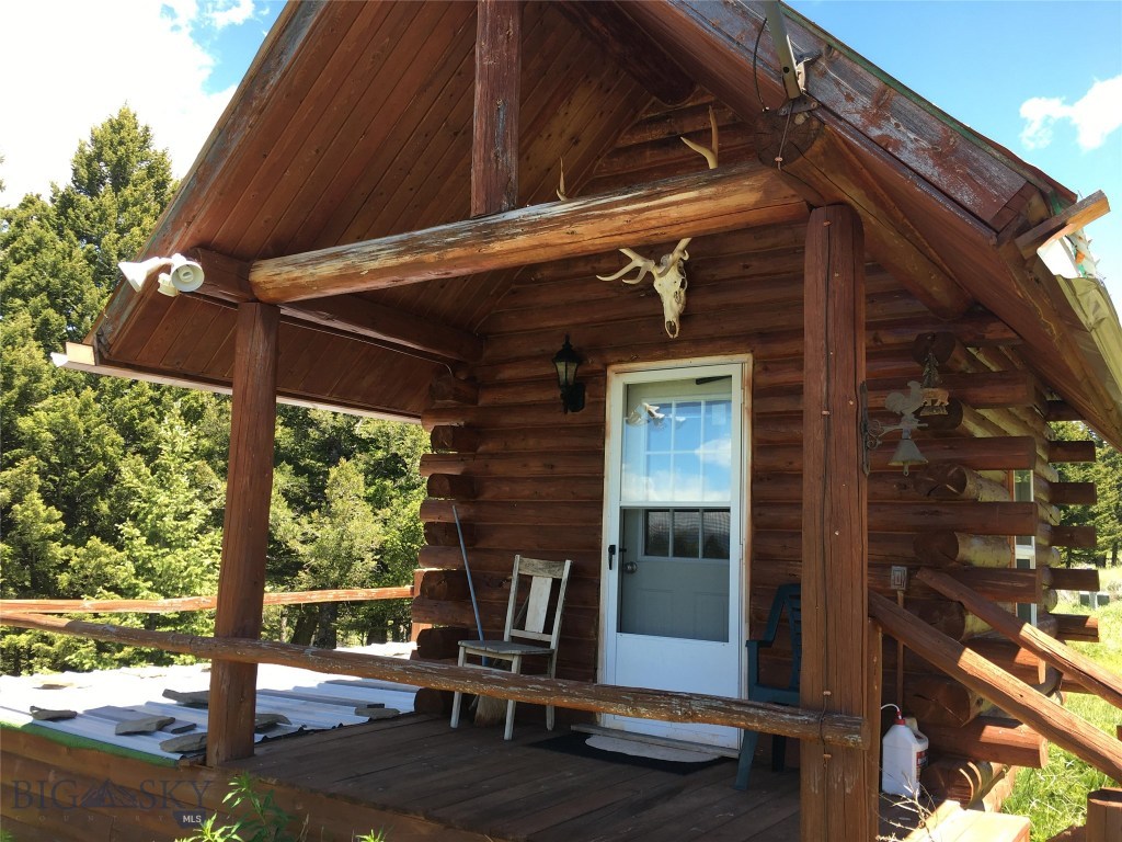 One room cabin with a loft.