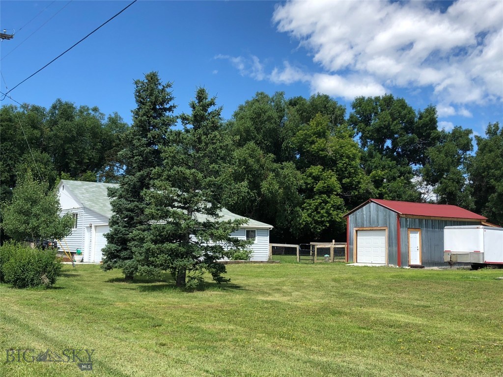 Big beautiful yard with lots of storage.