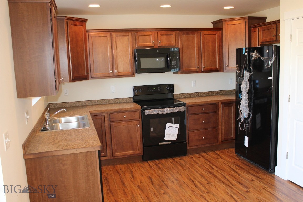 Kitchen. Photo of similar home.
