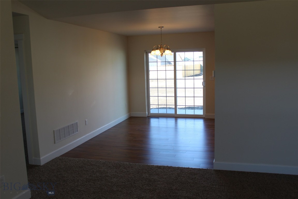 Dining room. Photo of similar home.