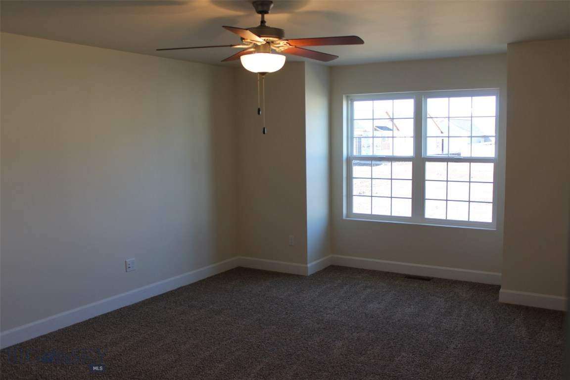 Master bedroom. Photo of similar home.