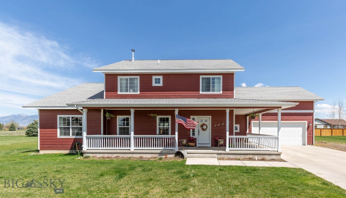 Front of the home with wrap around porch.