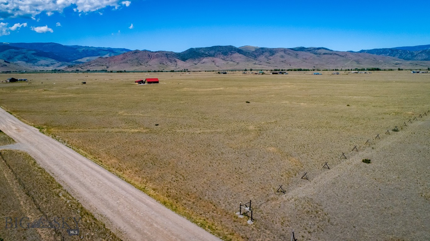 Mountains to the West. Fence is the border.