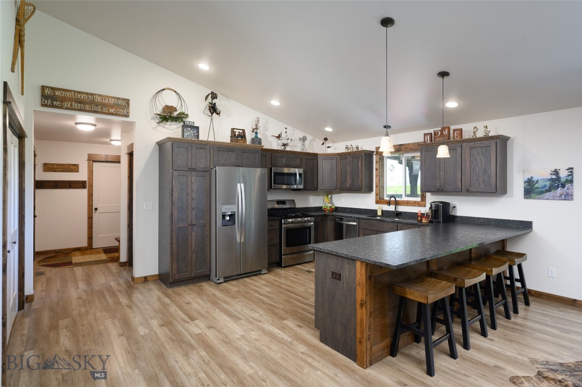 The kitchen offers ample storage. The master is be