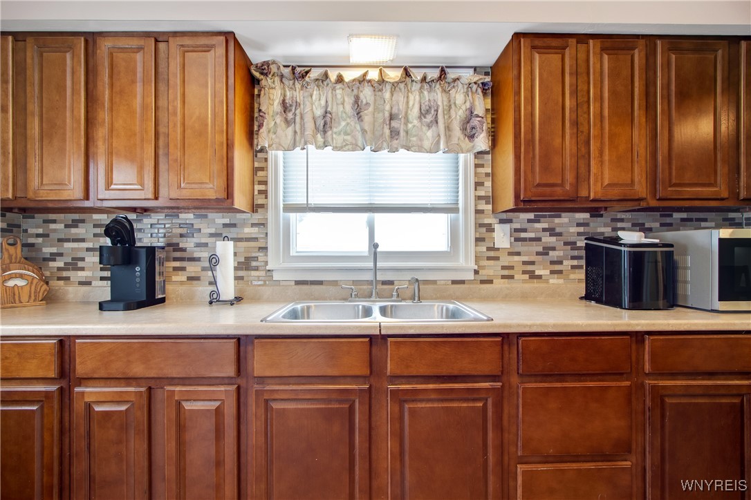 922 Center Road cherry cabinets,